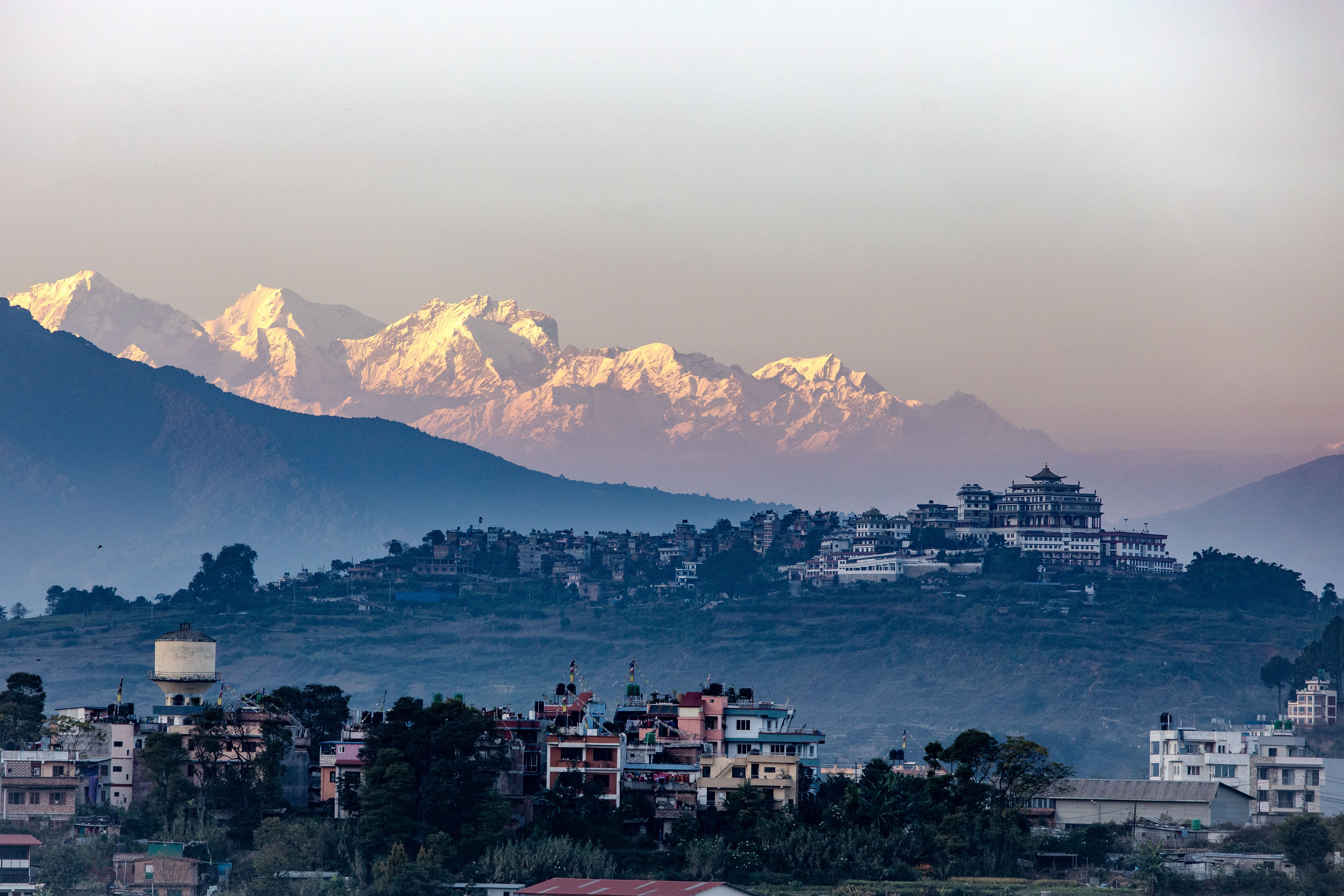 Himalayan mountains above a Nepal city